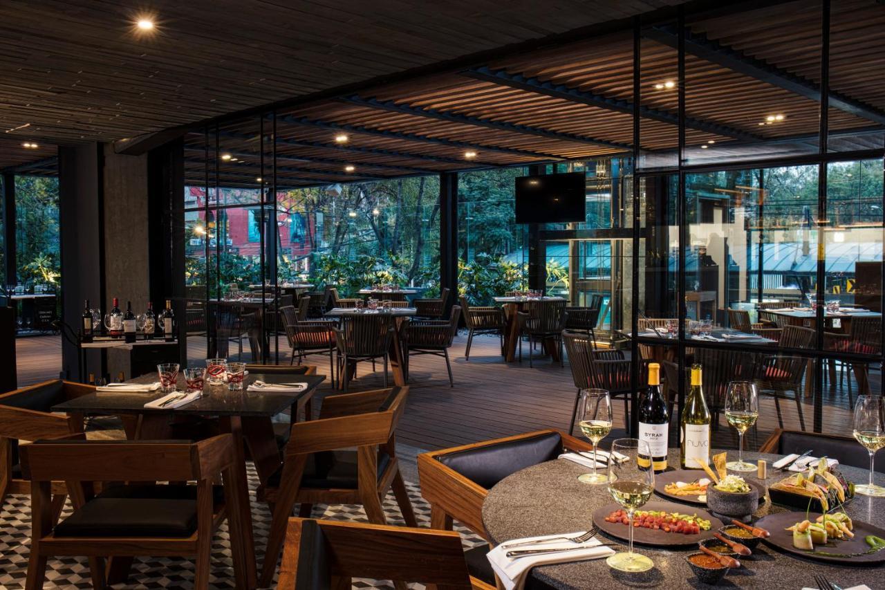 Krystal Grand Suites Insurgentes メキシコシティ エクステリア 写真 The interior of the restaurant