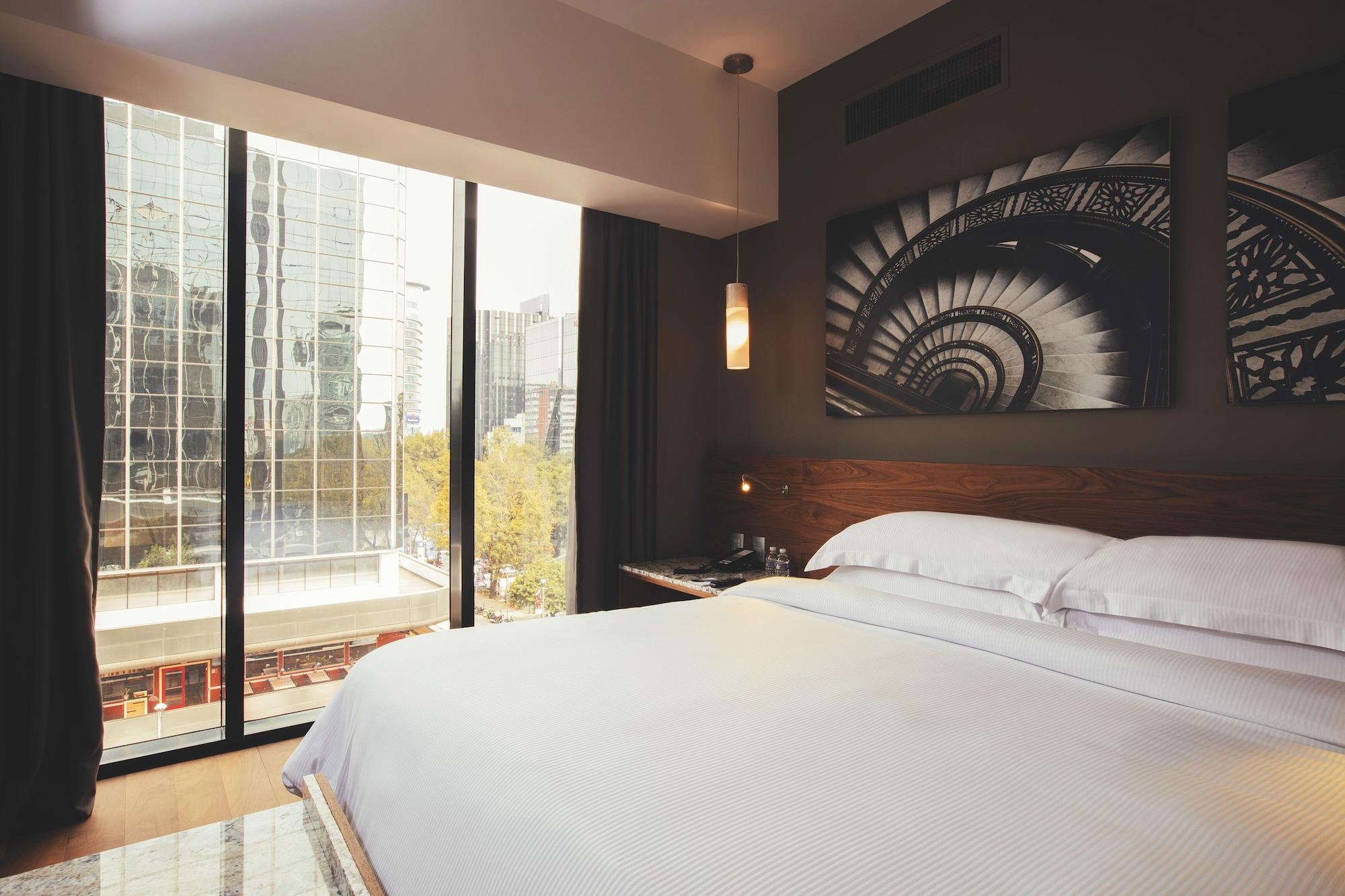 Krystal Grand Suites Insurgentes メキシコシティ エクステリア 写真 A room at the hotel