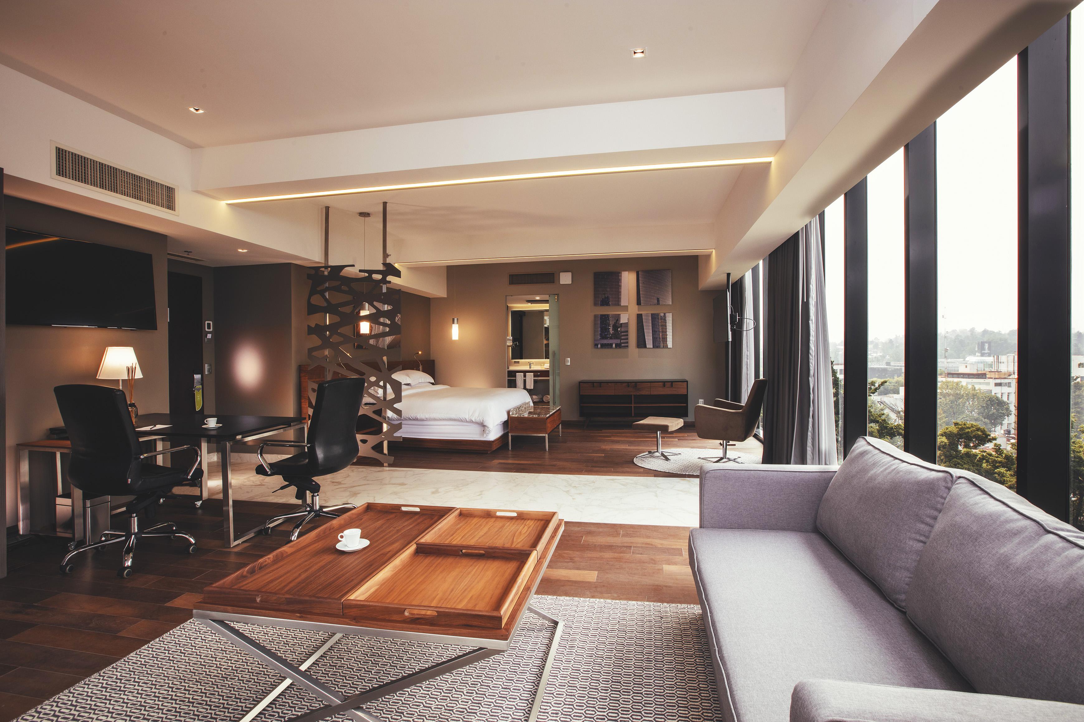 Krystal Grand Suites Insurgentes メキシコシティ エクステリア 写真 A suite at the hotel