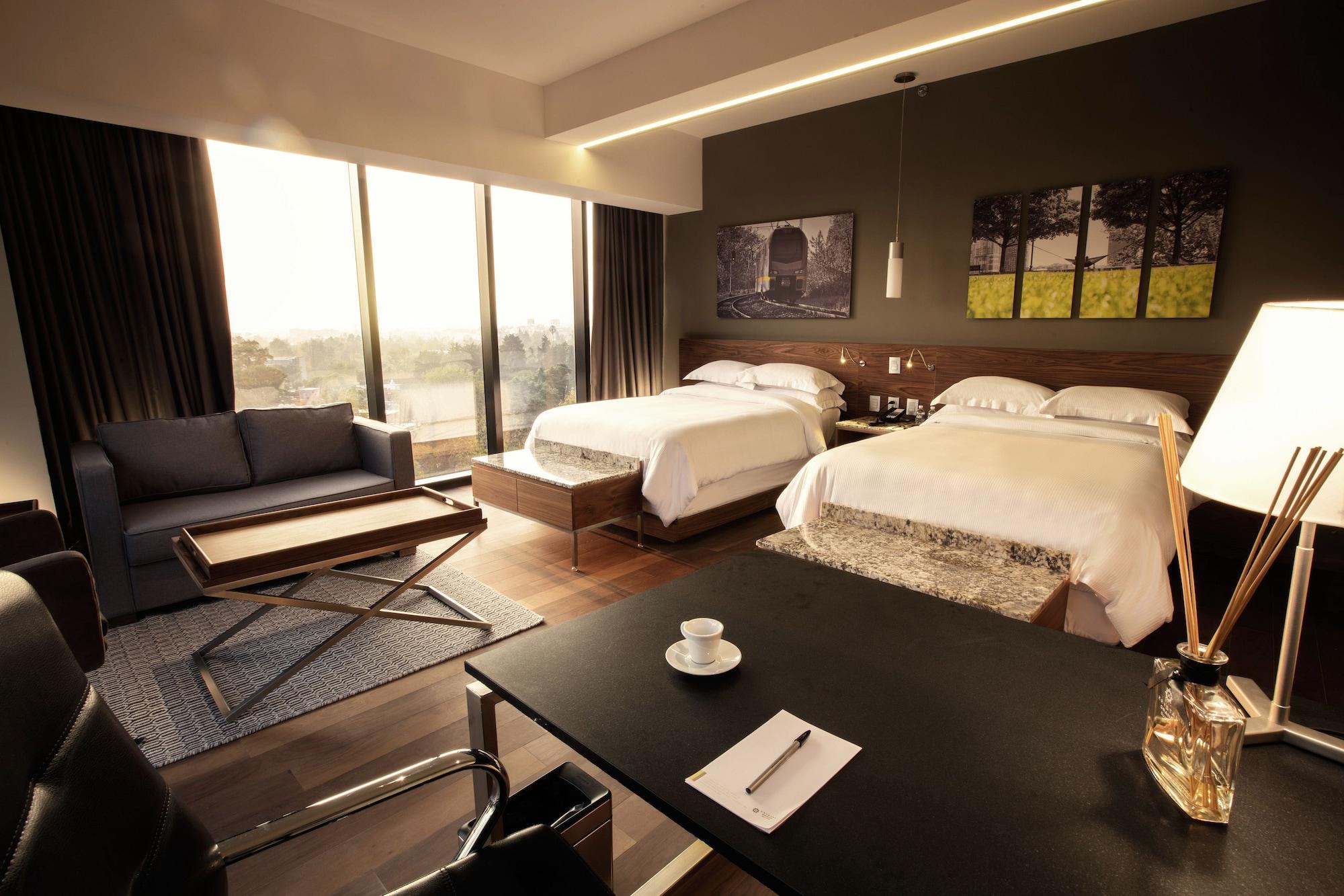 Krystal Grand Suites Insurgentes メキシコシティ エクステリア 写真 A room at the hotel